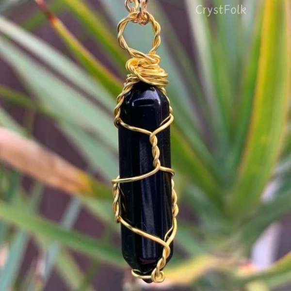 black crystal necklace meaning