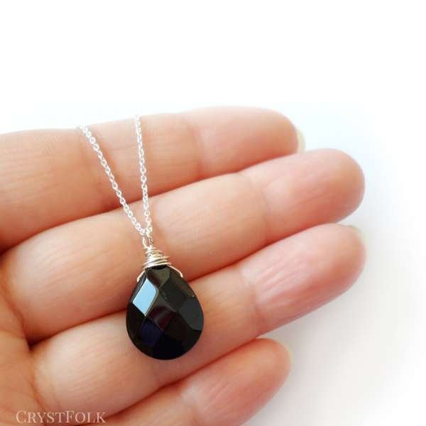 black crystal necklace meaning