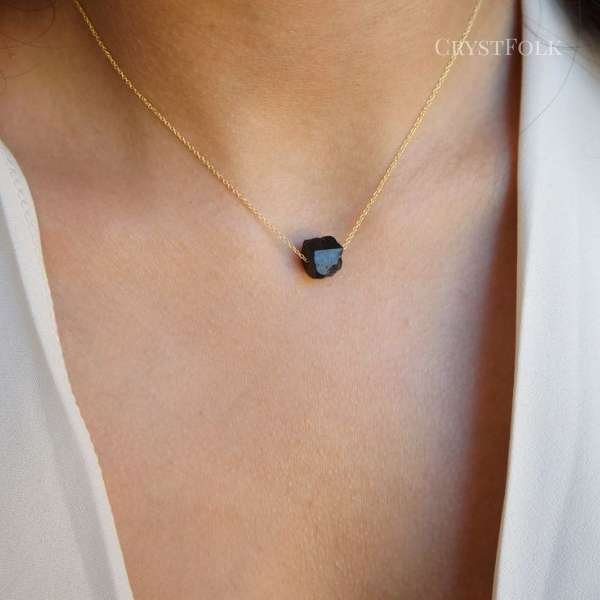 black crystal necklace meaning